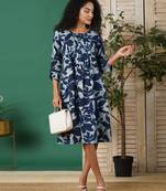 Pleated cotton printed dress with pocket.