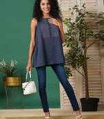 A-line south cotton tunic with chequered yoke and placket on front.