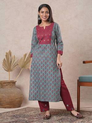 Straight cut printed kurta with a hand embroidered yoke and sleeve details. 1