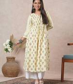 A flared cotton kurta  with embroidered neckline and blend of two different prints.