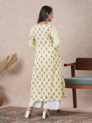 A flared cotton kurta  with embroidered neckline and blend of two different prints. 2