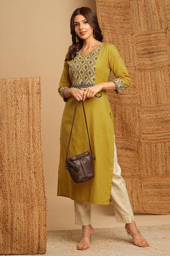 Straight fit kurta with hand block printed yoke and mirror details.