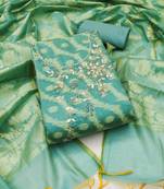 Sea green color weaving work banarasi jacquard unstitched dress material