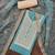 Sea green color embroidered work roman silk unstitched dress material