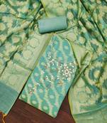 Sea green color weaving work banarasi jacquard unstitched dress material