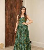 Green colour beautiful girlie rayon fabric partywear long gown for trendy looks wedding ceremony