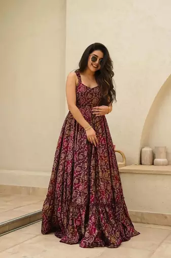 Purple colour beautiful rayon partywear long gown for trendy looks wedding ceremony