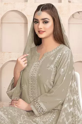 Cream embroidered faux georgette salwar suit