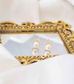 White pearl studs