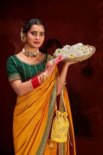 Ethnic Yellow Embroidered Saree With Trendy Swarovski Work And Heavy Work Blouse