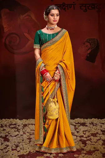 Ethnic Yellow Embroidered Saree With Trendy Swarovski Work And Heavy Work Blouse