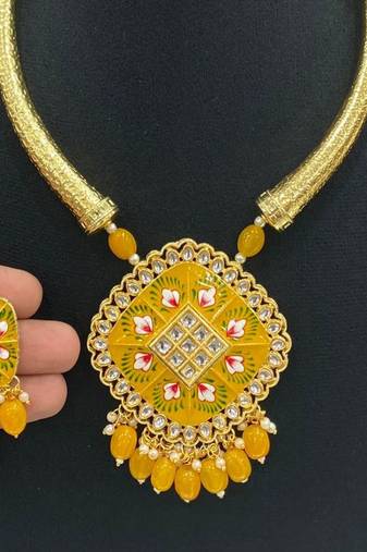 Hasli necklace set with matching earrings meenakari work, kundan stones, gold polish, adjustable drawstring