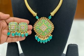 Hasli necklace set with matching earrings meenakari work, kundan stones, gold polish, adjustable drawstring 3