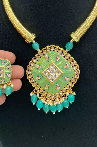 Hasli necklace set with matching earrings meenakari work, kundan stones, gold polish, adjustable drawstring