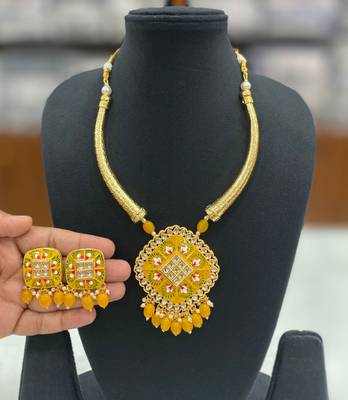 Hasli necklace set with matching earrings meenakari work, kundan stones, gold polish, adjustable drawstring 4