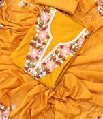 Mustard yellow embroidered floral  silk unstitched dress material