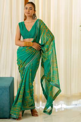 Teal Georgette Abstract Print Lace Border Saree With Unstitched Blouse Piece 1