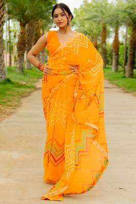 Light Orange Georgette Chevron/Zig Zag Print Lace Border Saree With Unstitched Blouse Piece 1