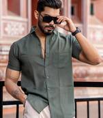 Bottle green half sleeve solid shirt