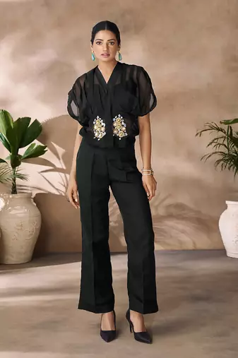 Fashionable black women's shirt top and pant set