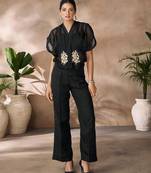 Fashionable black women's shirt top and pant set