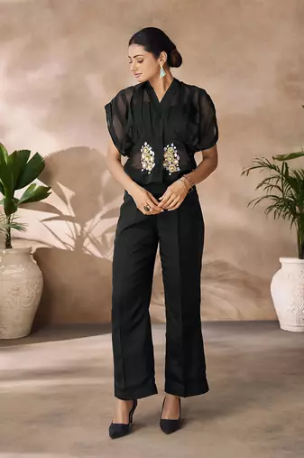 Fashionable black women's shirt top and pant set