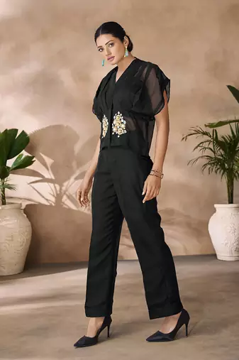 Fashionable black women's shirt top and pant set