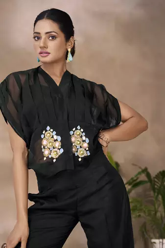 Fashionable black women's shirt top and pant set