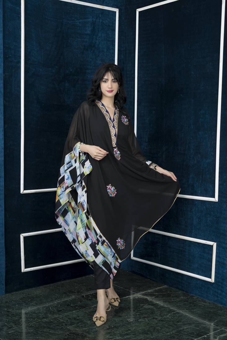 Nikhaar black embroidered georgette asymmetrical kurta & pants set