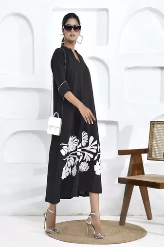 Bold black floral embroidered shirt dress