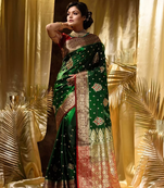 Green and red banarasi silk saree with blouse piece.