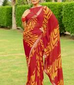 Maroon Georgette Geometric Print Lace Border Saree With Unstitched Blouse Piece