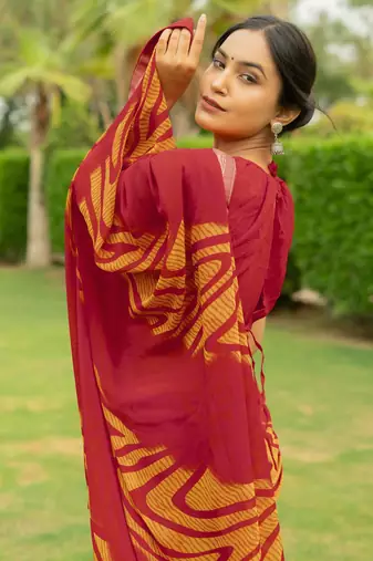 Maroon Georgette Geometric Print Lace Border Saree With Unstitched Blouse Piece