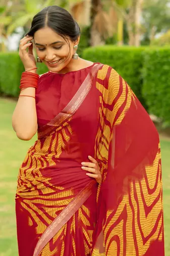 Maroon Georgette Geometric Print Lace Border Saree With Unstitched Blouse Piece