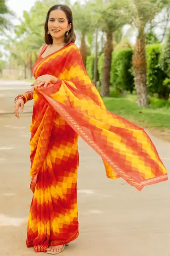 Orange Georgette Geometric Print Lace Border Saree With Unstitched Blouse Piece