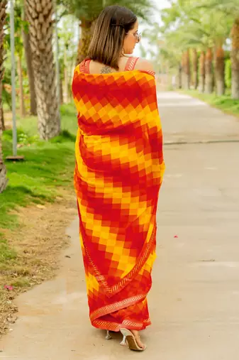 Orange Georgette Geometric Print Lace Border Saree With Unstitched Blouse Piece