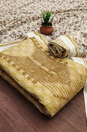 Manvaa women's yellow designer printed work cotton dress material