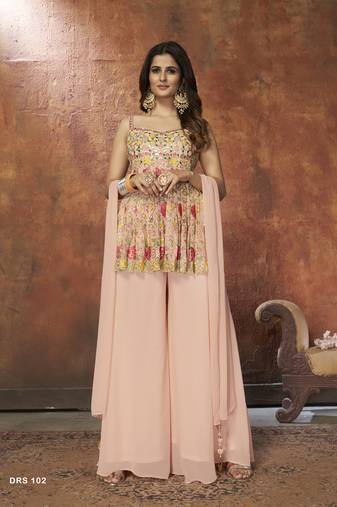 Elegant peach embroidered peplum kurta pallazos set
