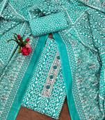 Women's sea green unstitched fancy print work with thread embrodered neck tie along with designer printed dress material