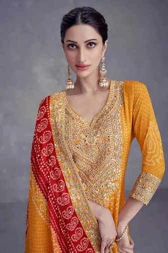 Yellow heavy gota & mirrow wrok bandhani silk suits