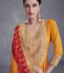 Yellow heavy gota & mirrow wrok bandhani silk suits