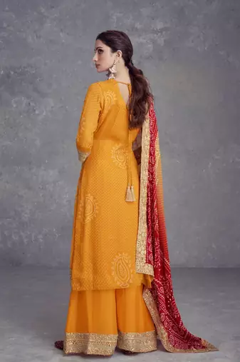 Yellow heavy gota & mirrow wrok bandhani silk suits