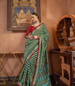 Green silk blend Blend Patola Saree With Unstitched Blouse Piece
