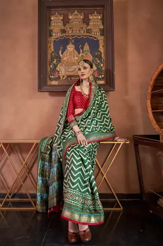 Green silk blend Blend Patola Saree With Unstitched Blouse Piece