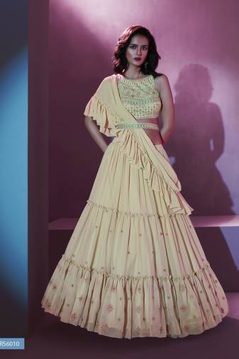 Cream ruffle lehenga choli with  dupatta and belt