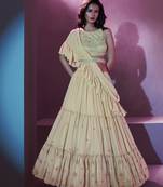 Cream ruffle lehenga choli with  dupatta and belt