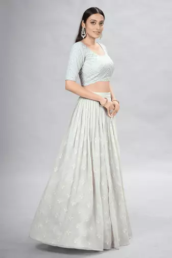 Off-White Embroidered Lehenga Choli with Ruffled Dupatta