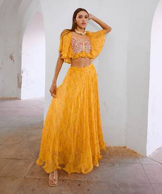 Gulbahar marigold yellow  jugnu sitara butterfly blouse with flair skirt set. 2