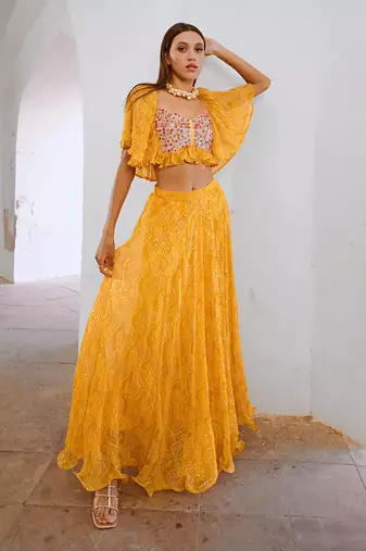 Gulbahar marigold yellow  jugnu sitara butterfly blouse with flair skirt set.