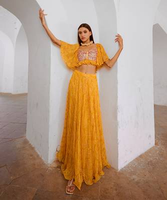 Gulbahar marigold yellow  jugnu sitara butterfly blouse with flair skirt set. 3